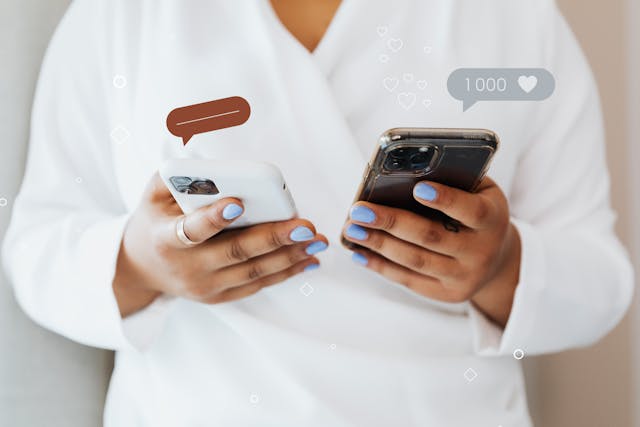 pexels-karolina-grabowska-6214965 | Path Social Person holding two smartphones and engaging in social media interactions.