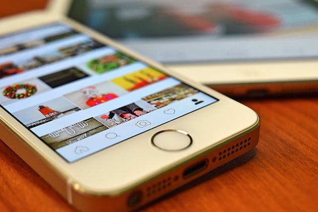 pexels-pixabay-163184 | Path Social An iPhone displaying the Instagram Interface.