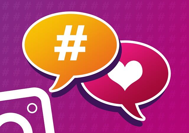 An orange speech bubble with the hashtag symbol next to a hot pink speech bubble with the Instagram heart symbol.